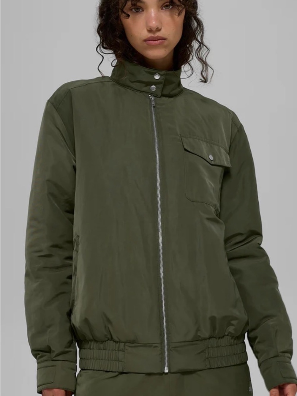 ALO Yoga  Work It Bomber Jacket in Green Olive